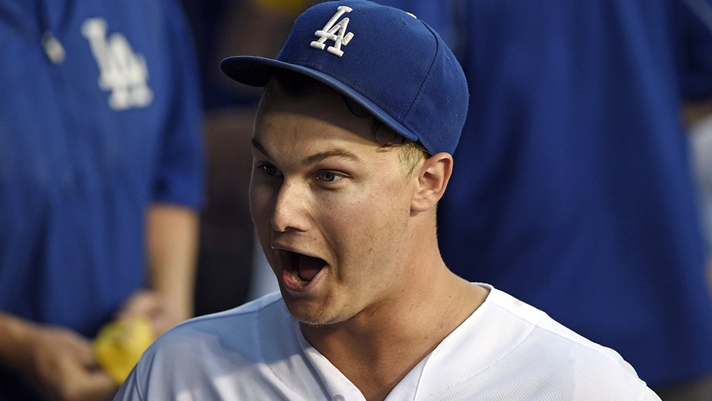 Joc Pederson is working out in the Pacific Ocean while spending