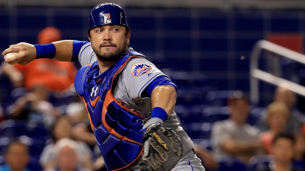 MIAMI, FL - SEPTEMBER 18: Travis d'Arnaud #18 of the New York Mets makes a throw to first during a game against the Miami Marlins at Marlins Park on September 18, 2017 in Miami, Florida. (Photo by Mike Ehrmann/Getty Images)