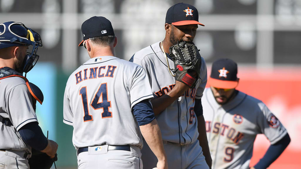 Reymin Guduan leaves Game 1 after walking five A's in a row in the bottom of the eighth inning. (Getty)