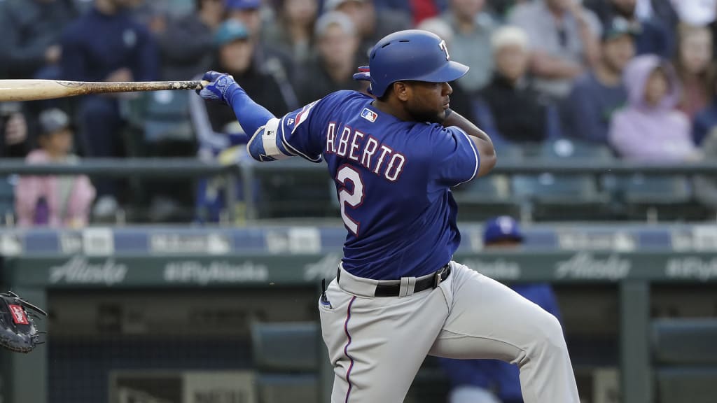 Texas Rangers' Hanser Alberto singles against the Seattle Mariners in the third inning of a baseball game Wednesday, May 30, 2018, in Seattle. (AP Photo/Elaine Thompson)