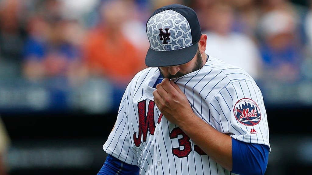 Matt Harvey returns to the dugout Monday after allowing 11 hits and six runs (five earned) against the Marlins. (AP)