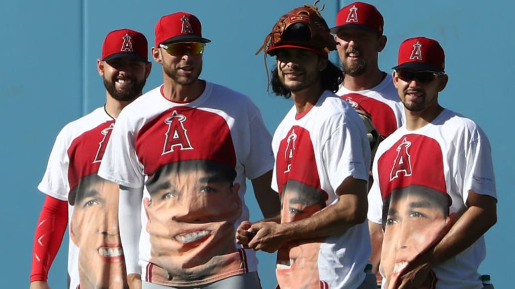 Angels fans hypnotized the camera with Mike Trout's face everywhere thanks  to Trout Shirt Night