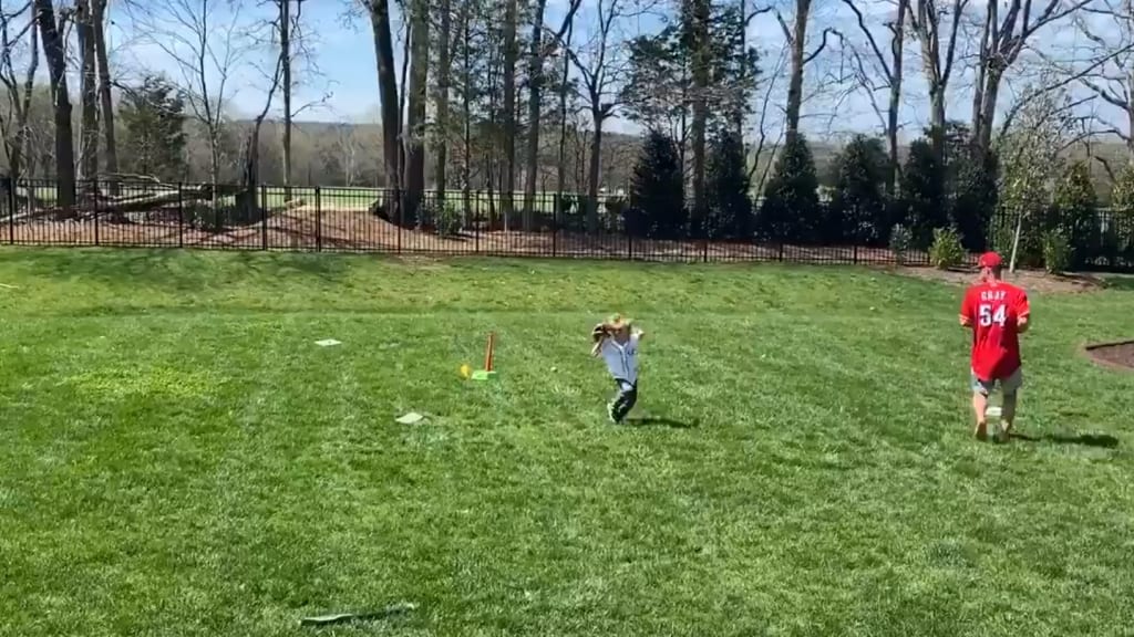 WATCH: Freeman crushes son's pitch in 'backyard baseball