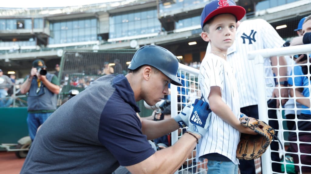 aaron judge and a fan