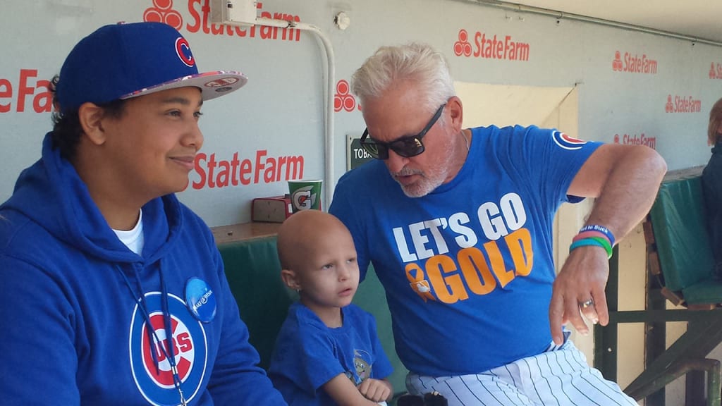 Cubs manager Joe Maddon spent time with Audrey Hughes, who was recognized on MLB's pediatric cancer awareness event. (Cubs)
