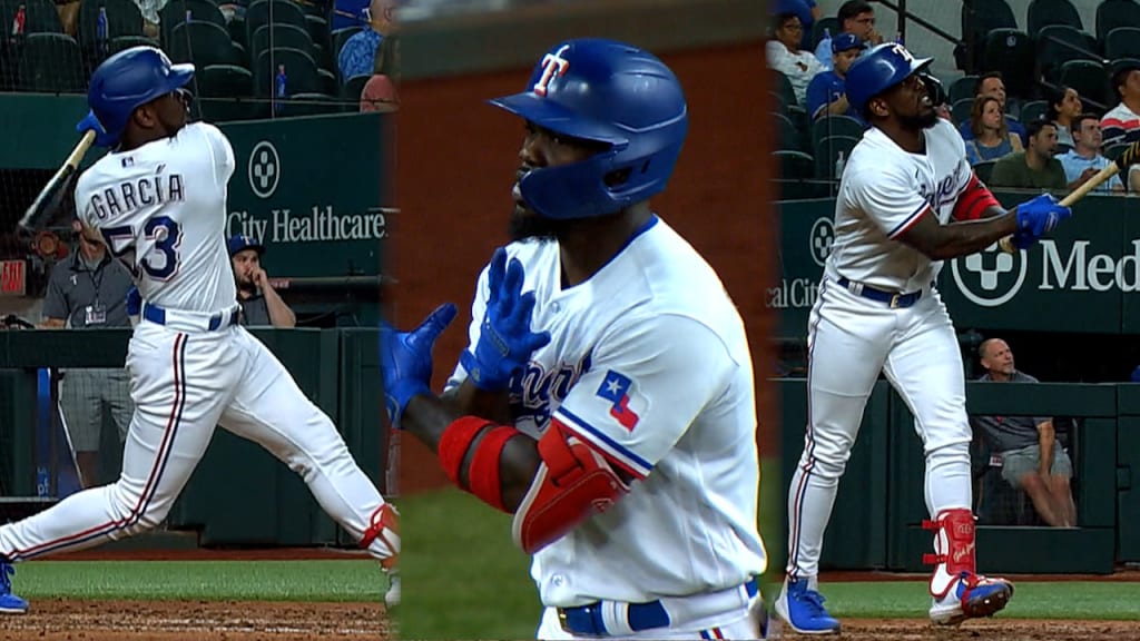 Rangers slugger Adolis García, leading the AL in RBIs, exits game after  getting hit by a pitch