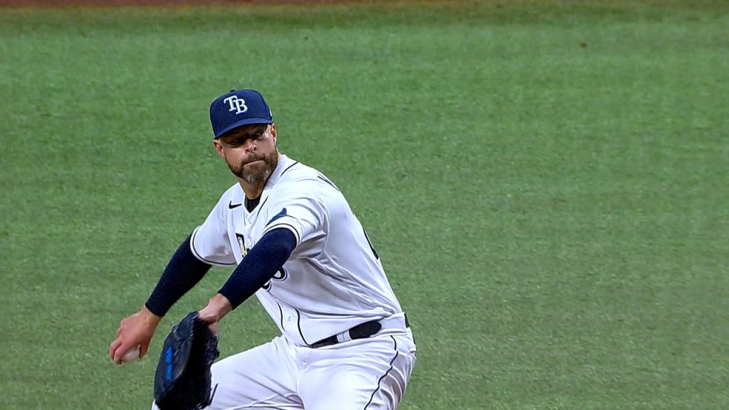 Tampa Bay Rays pitcher Phoenix Sanders, left, throws to first base