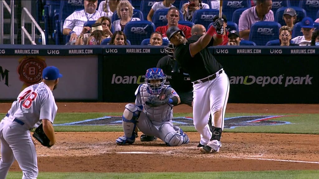 Marlins knock out Cubs in 11th