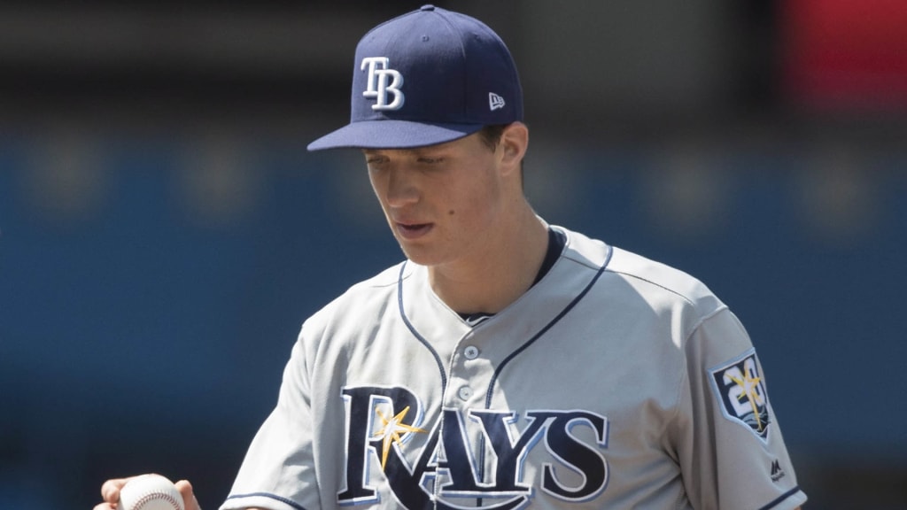 Tampa Bay Rays manager Kevin Cash takes the ball from starting pitcher Tyler Glasnow in the sixth inning of their baseball game against the Blue Jays in Toronto on Sunday Aug. 12, 2018. (Fred Thornhill/The Canadian Press via AP)