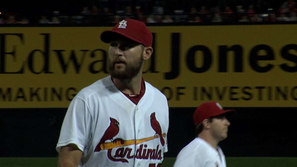 St. Louis Cardinals manager Mike Matheny and Mark McGwire watch