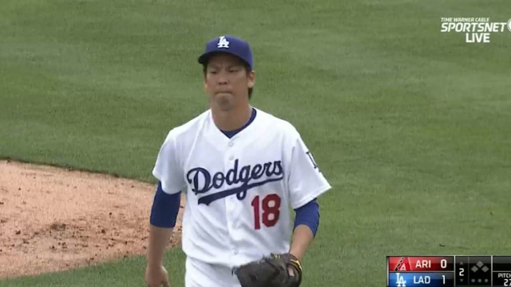 Japanese right-hand pitcher Kenta Maeda, wearing No. 18, speaks during his  introductory press conference at Dodger Stadium in Los Angenles on Jan. 7,  2016. The former Hiroshima Carp ace made the official