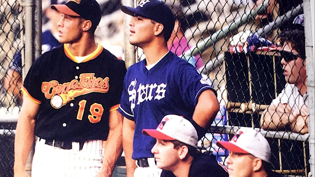 Gabe Kapler, Hawaii league home run champ in 1996, watches a game with a few players from other teams. Photo via Catch The Dream