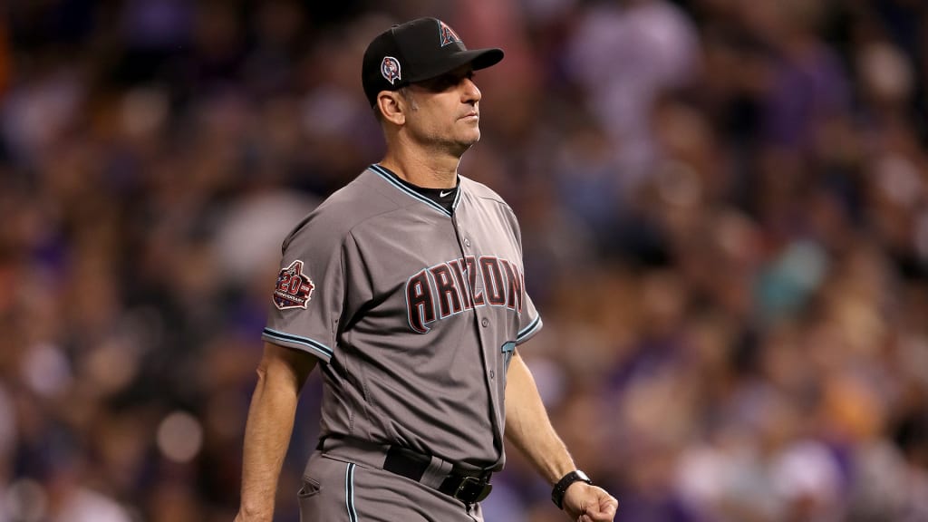 DENVER, CO - SEPTEMBER 11: Manager Torey Lovullo of the Arizona Diamondbacks walks back to the dugout after changing pitchers in the seventh inning against the Colorado Rockies at Coors Field on September 11, 2018 in Denver, Colorado. (Photo by Matthew Stockman/Getty Images)
