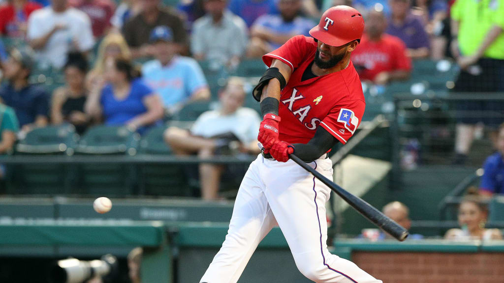 ARLINGTON, TX - SEPTEMBER 01: Nomar Mazara #30 of the Texas Rangers swings for a solo home run in the second inning of a baseball game against the Minnesota Twins at Globe Life Park in Arlington on September 1, 2018 in Arlington, Texas. (Photo by Richard Rodriguez/Getty Images)