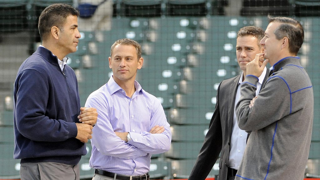 Talking with Cubs owner Tom Ricketts (right), Jason McLeod (left) has worked with Jed Hoyer (second from left) and Theo Epstein (second from right) in Boston, San Diego and Chicago. (Getty Images)