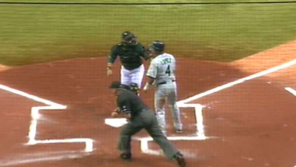 Tampa Bay Devil Rays' Tino Martinez, right, argues with umpire
