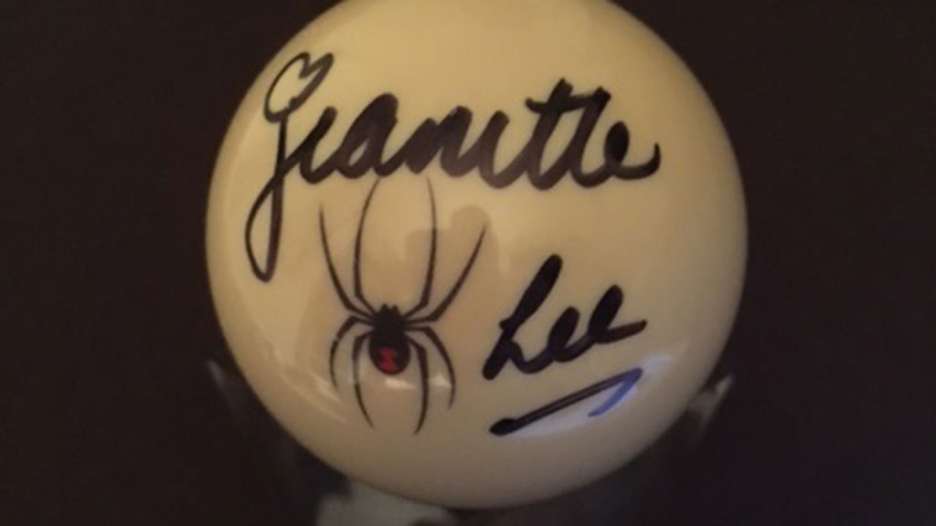 Jeanette "Black Widow" Lee signed a cue ball for Kevin Kiermaier.