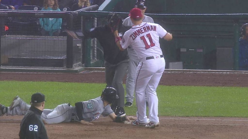 Riddle swims past the tag
