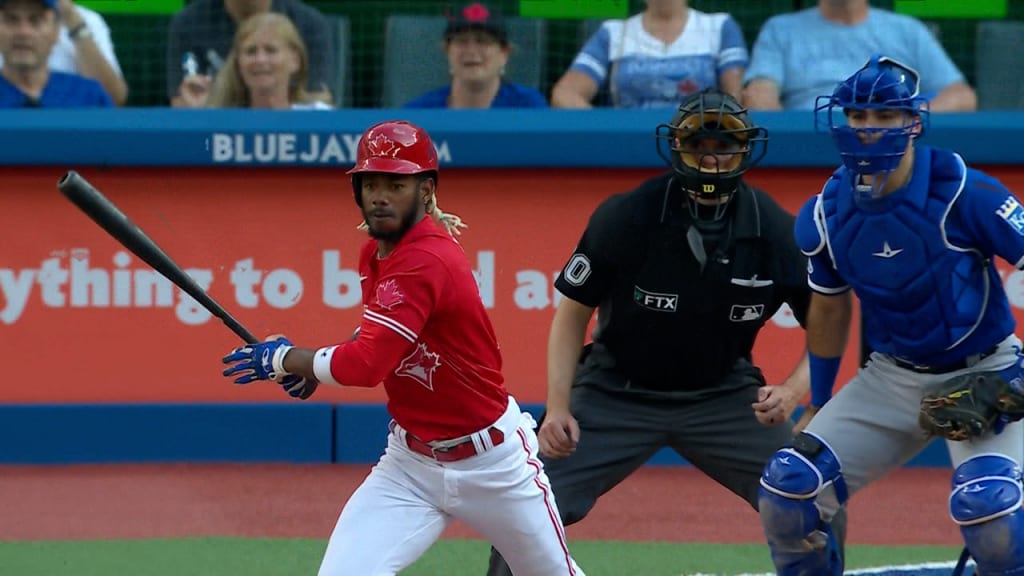 TORONTO, ON - APRIL 12: Legendary Montreal Expos pitcher Pedro Martínez  (45) shakes hands with Toronto Blue Jays First base Vladimir Guerrero Jr.  (27) before the MLB baseball regular season game between