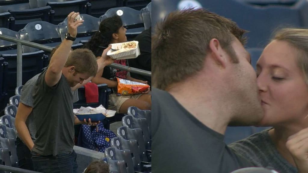Fan makes a one-handed catch