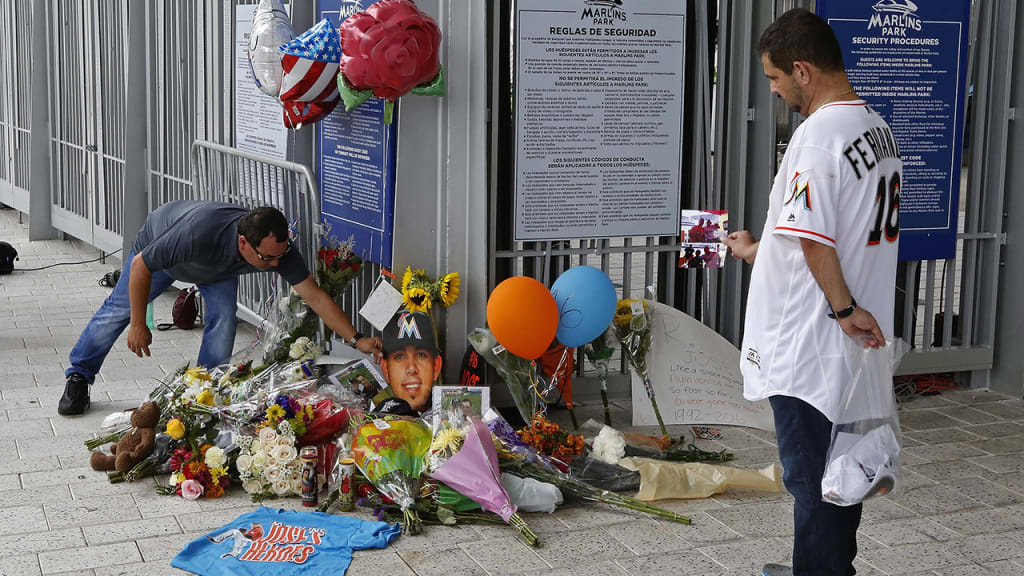 Items are placed at a memorial at Marlins Park for Jose Fernandez. (Joe Skipper/Getty Images)