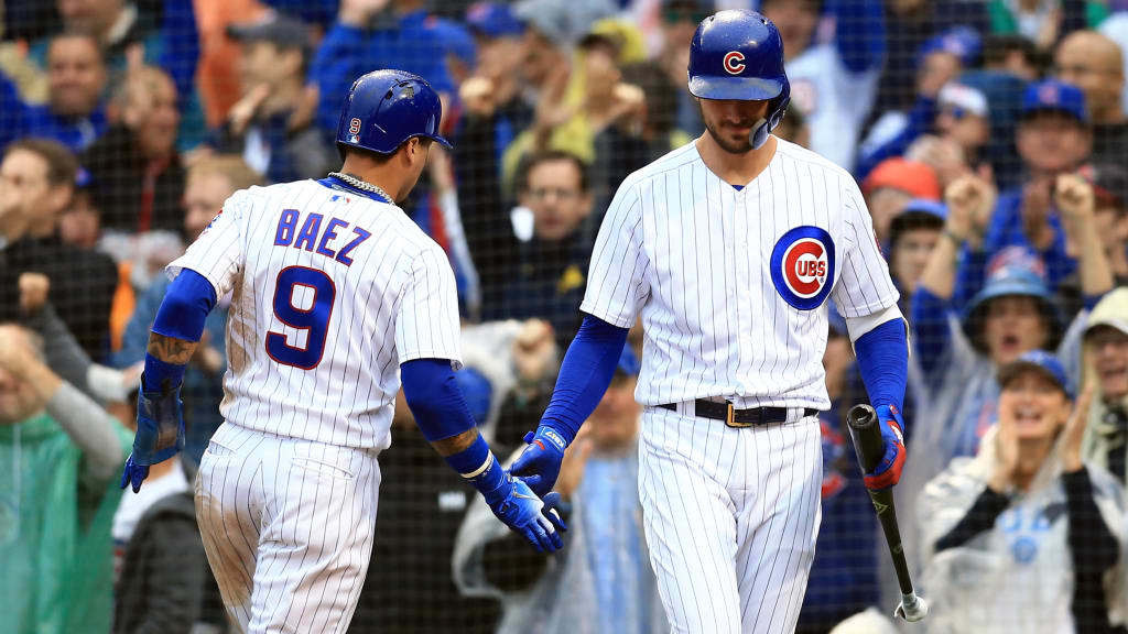CHICAGO, IL - SEPTEMBER 30: Javier Baez #9 of the Chicago Cubs celebrates with Kris Bryant #17 after scoring a run during the third inning against the St. Louis Cardinals at Wrigley Field on September 30, 2018 in Chicago, Illinois. (Photo by Andrew Weber/Getty Images)