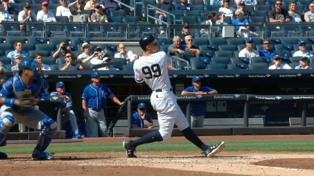 New York Yankees Outfielder Nick Swisher (#33) heads to first. The