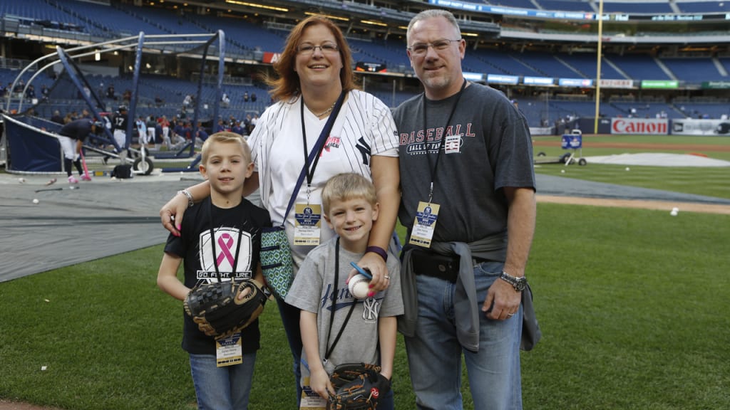 Renee Heine poses with her family on Mother's Day at Yankee Stadium. (Bryan Hoch/MLB.com)