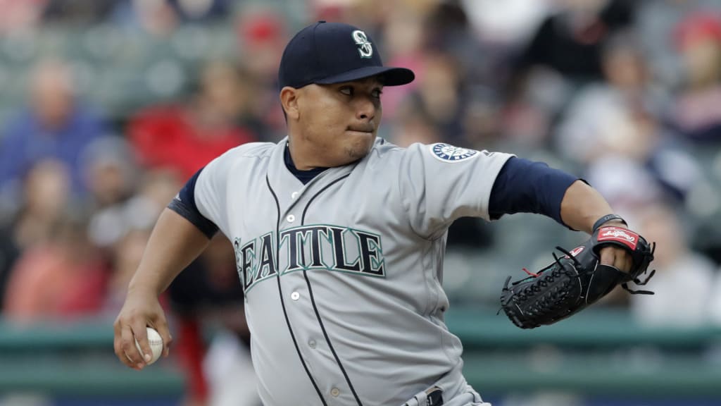 Seattle Mariners starting pitcher Erasmo Ramirez winds up during the first inning of the team's baseball game against the Cleveland Indians, Friday, April 27, 2018, in Cleveland. (AP Photo/Tony Dejak)