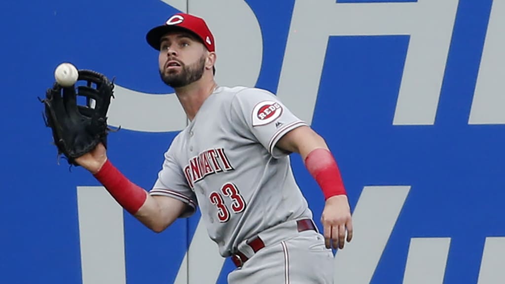 CLEVELAND, OH - JULY 10: Jesse Winker #33 of the Cincinnati Reds makes a catch to get out Tyler Naquin #30 of the Cleveland Indians during the fourth inning at Progressive Field on July 10, 2018 in Cleveland, Ohio. The Reds defeated the Indians 7-4. (Photo by Ron Schwane/Getty Images)