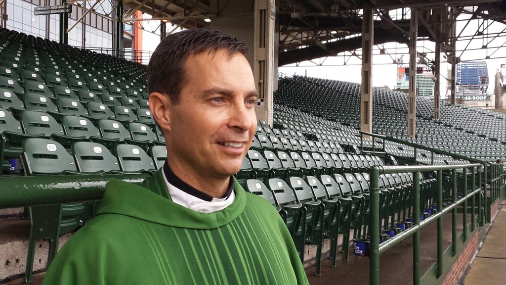 Father Burke Masters has been holding Sunday mass at Wrigley Field for four years. (MLB.com)