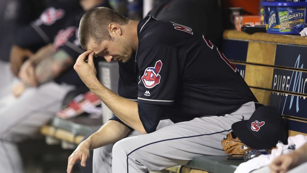 Cleveland Indians relief pitcher Andrew Miller sits in the dugout after being removed, having given up a bases-loaded walk during the seventh inning of a baseball game against the Detroit Tigers, Tuesday, May 15, 2018, in Detroit. (AP Photo/Carlos Osorio)