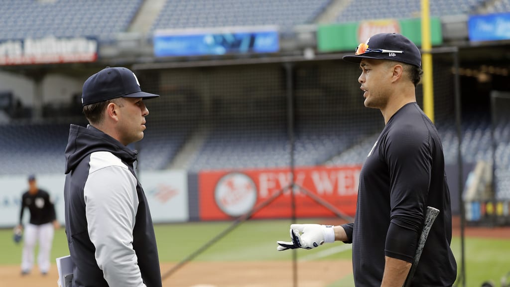A hitting coach in his first year has a ton of jobs and priorities, but for Lawson, there’s the reality that he gets to work with some of the game’s greats, such as Giancarlo Stanton (R). He lauds the way in which the team’s big-name stars handle their business, allowing the new hitting coach to remain focused on the tangible parts of the job.