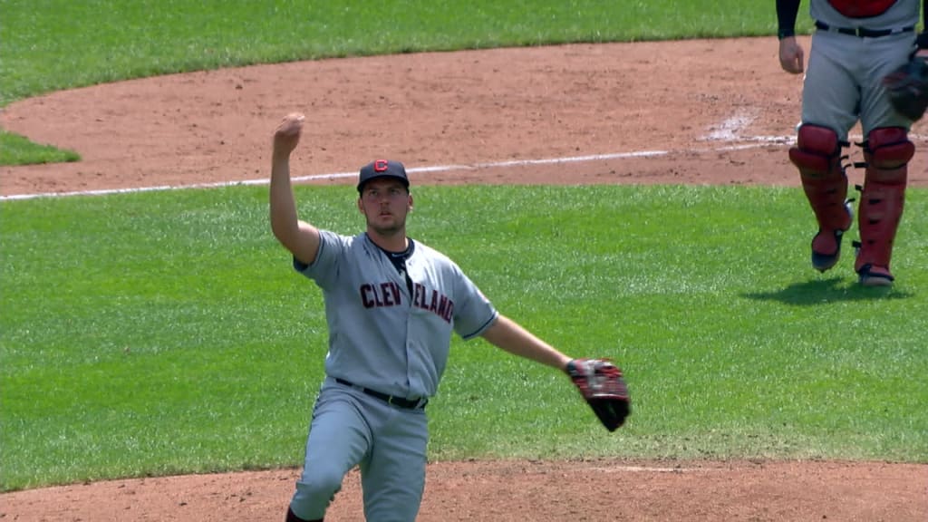 Long toss: Indians pitcher Trevor Bauer throws ball over center-field fence