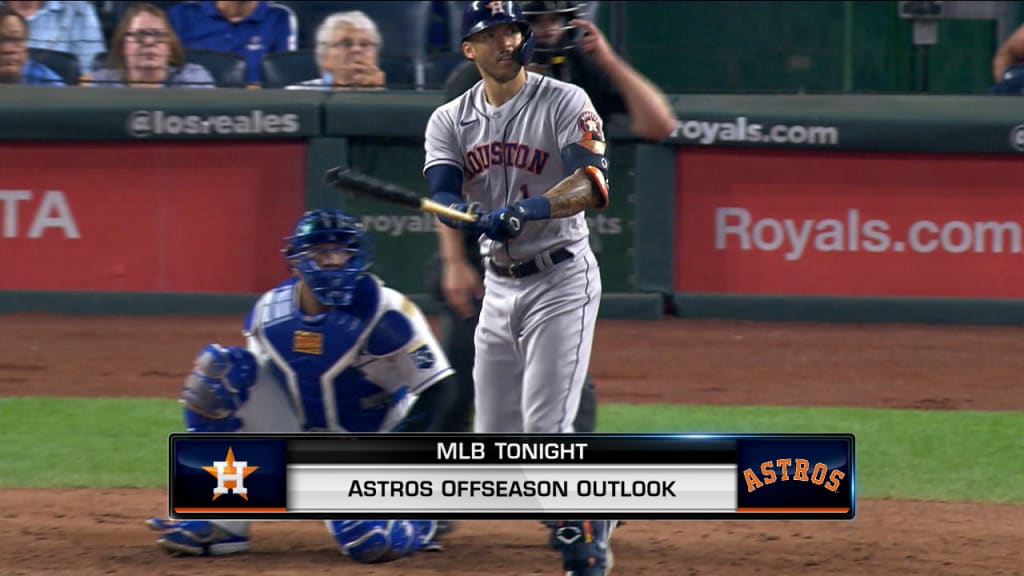 Houston Astros center fielder Jake Meyers signs an autograph after