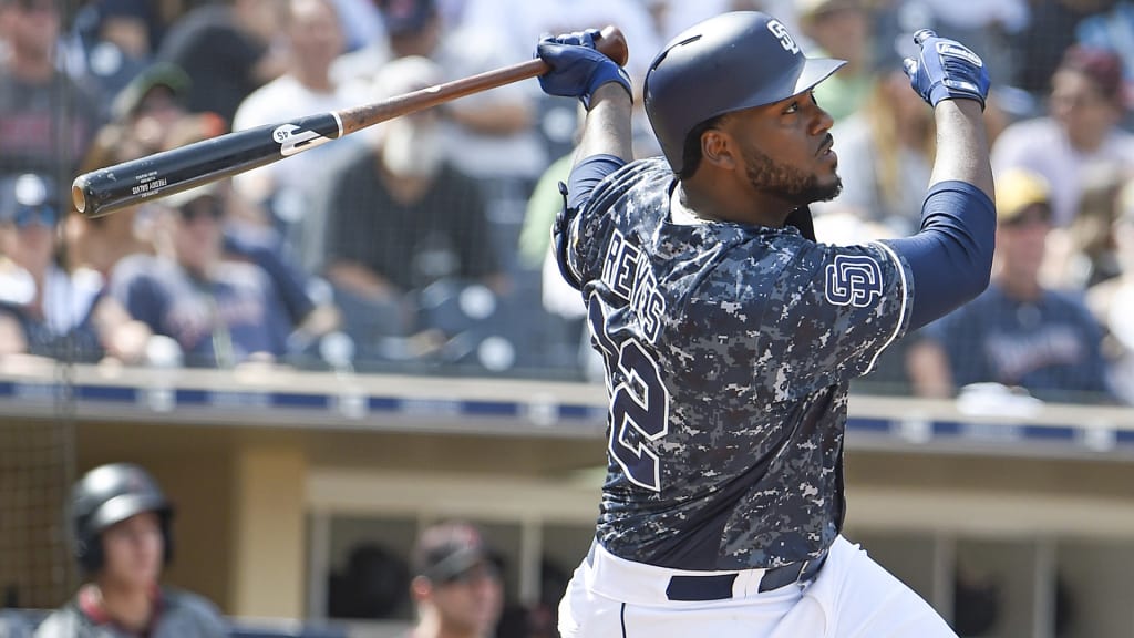 SAN DIEGO, CA - SEPTEMBER 30: Franmil Reyes #32 of the San Diego Padres hits an RBI double during the fifth inning of a baseball game against the Arizona Diamondbacks at PETCO Park on September 30, 2018 in San Diego, California. (Photo by Denis Poroy/Getty Images)