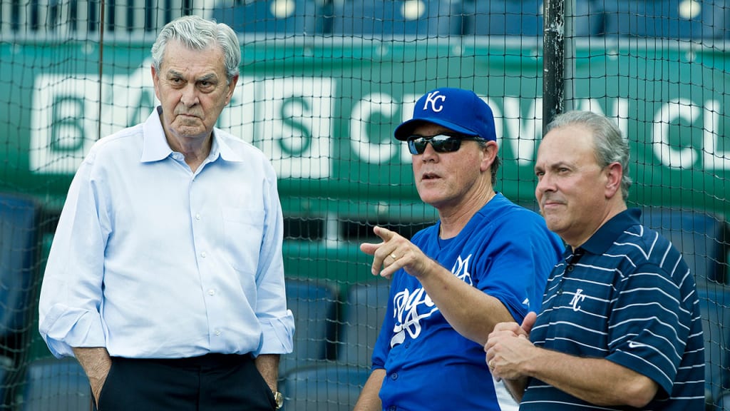 Team owner David Glass, left, manager Ned Yost, center, and president Dan Glass. (Getty Images)