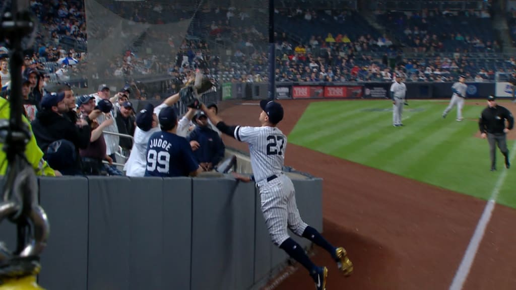 Stanton's leaping grab into seats