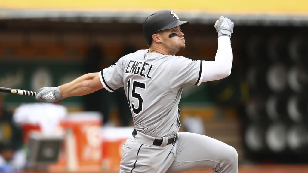 Chicago White Sox's Adam Engel swings for an RBI single off Oakland Athletics pitcher Andrew Triggs during the second inning of a baseball game Wednesday, April 18, 2018, in Oakland, Calif. (AP Photo/Ben Margot)