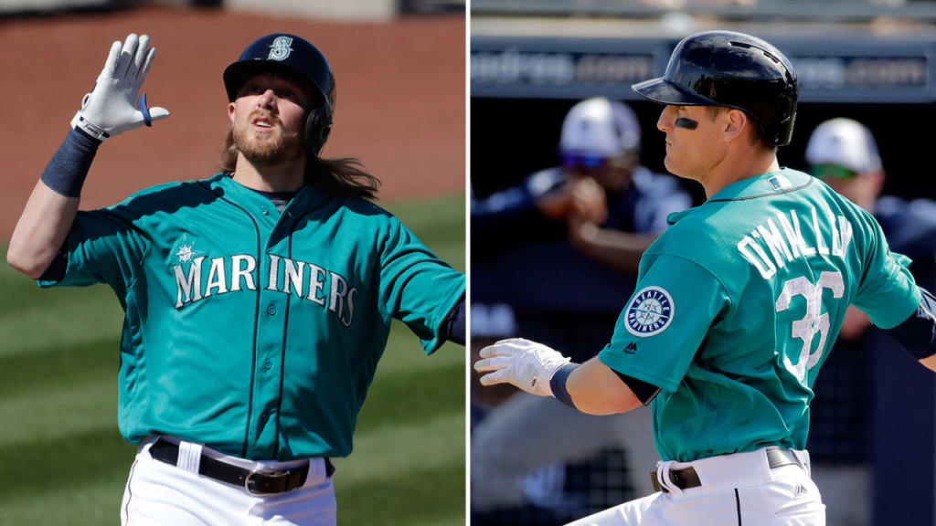 Taylor Motter and Shawn O'Malley are in competition for a utility role with the Mariners. (AP).