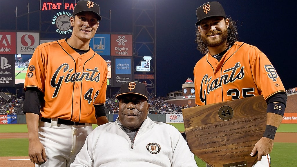 Giants great Willie McCovey joins Javier Lopez and Brandon Crawford -- co-winners of the 2016 Willie Mac Award -- last year at AT&T Park. (Getty)