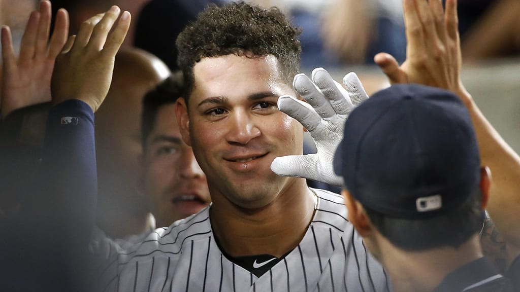 FILE - In this Aug. 26, 2016, file photo, New York Yankees' Gary Sanchez is congratulated after hitting a fifth-inning, two-run home run in a baseball game against the Baltimore Orioles in New York. Corey Seager of the Los Angeles Dodgers is the favorite in the NL, while Michael Fulmer of Detroit and Gary Sanchez of the New York Yankees are top contenders in the AL when the Rookie of the Year awards are announced Monday night, Nov. 14, 2016. (AP Photo/Kathy Willens, File)