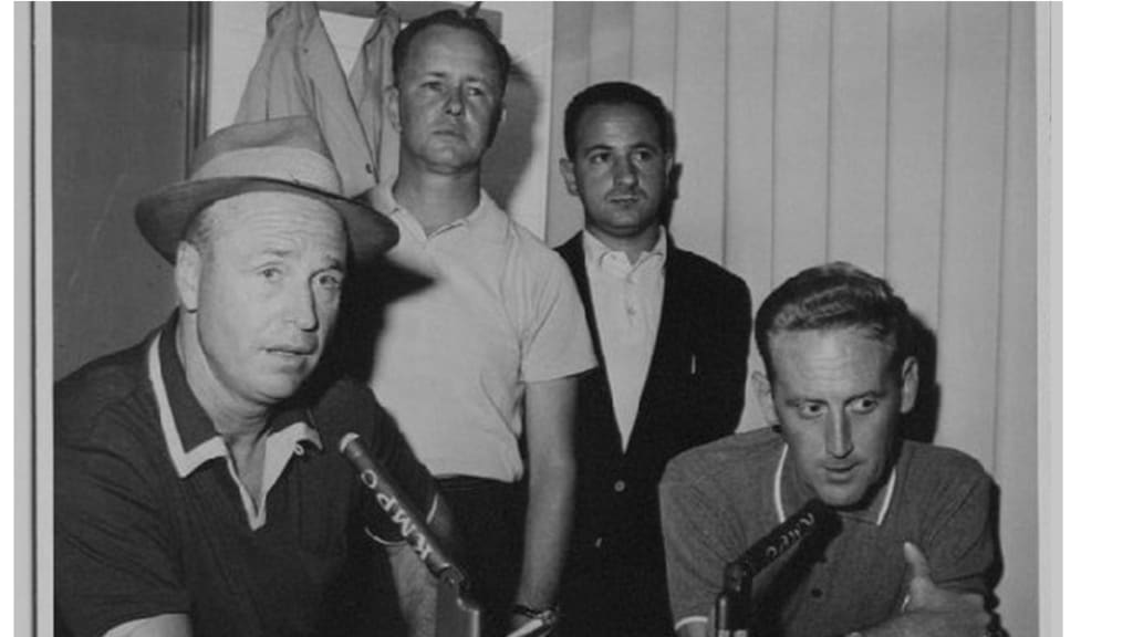 Villante (second from right) in the Dodgers radio booth with Walt Alston, Jerry Doggett and Vin Scully.