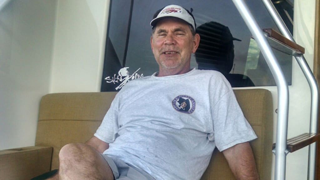 Giants manager Bruce Bochy relaxes on a fishing boat in Costa Rica with members of Purple Heart Anglers.