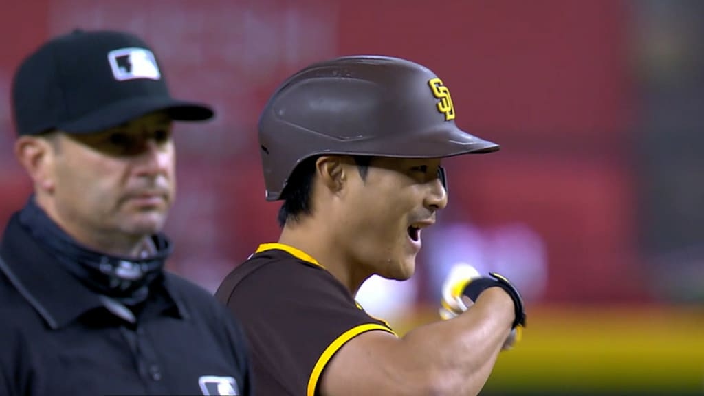 San Diego Padres catcher Austin Nola adjusts his helmet as he