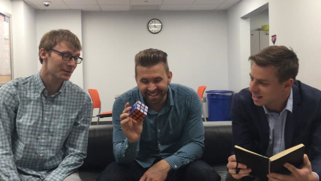 Dozier solves Rubik's Cube