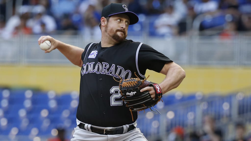 Colorado Rockies' Bryan Shaw delivers a pitch during the eighth inning of a baseball game against the Miami Marlins, Sunday, April 29, 2018, in Miami. The Marlins defeated the Rockies 3-0. (AP Photo/Wilfredo Lee)