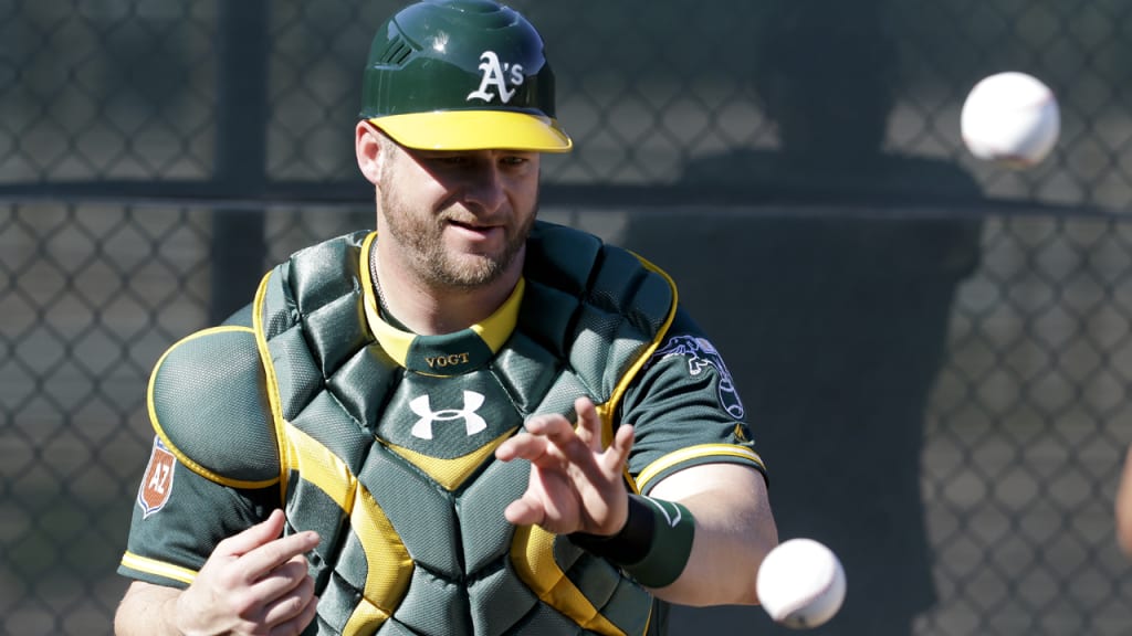 A's catcher Stephen Vogt works on drills at Spring Training. (Chris Carlson/AP)