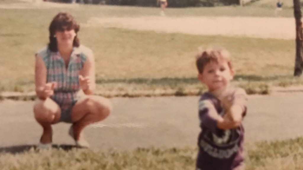 A young Ian Kinsler with his mother, Kathy
