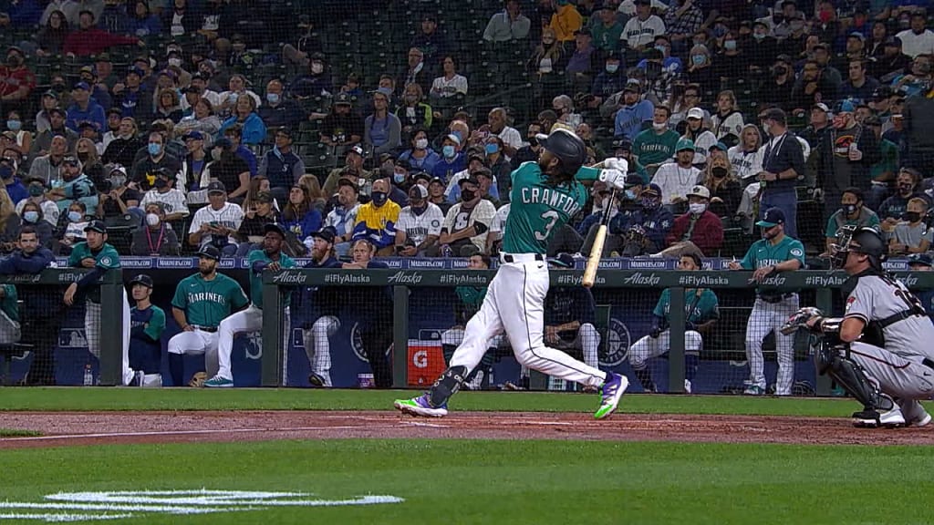 Seattle Mariners' Ty France smiles in the dugout after hitting a three-run  home run against the Cleveland Guardians in the eight inning during an  opening day baseball game Thursday, March 30, 2023